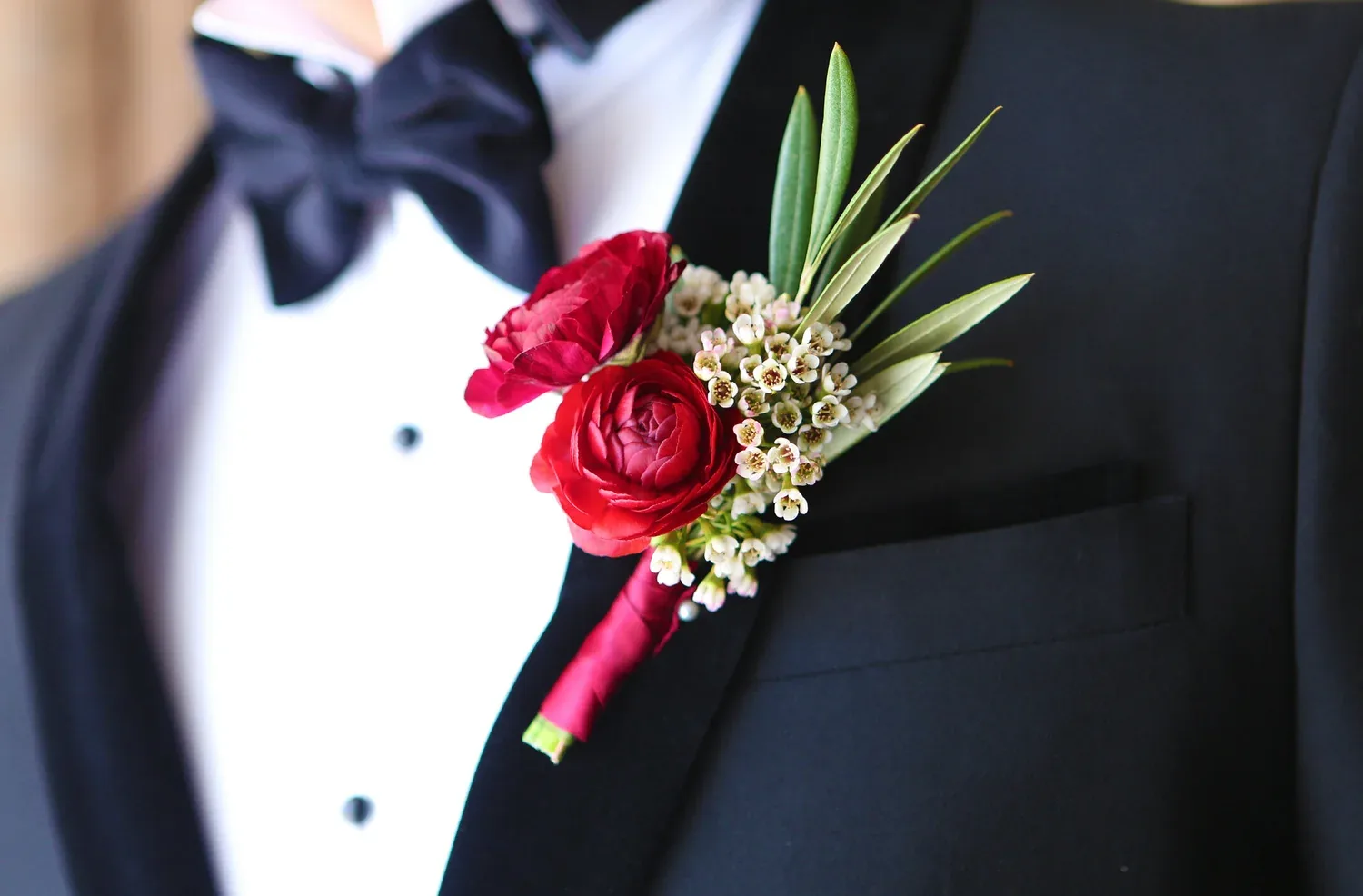 Wedding ceremony arch florals
